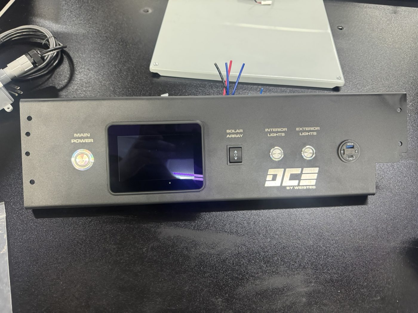 DCE TAP control panel with display and switches