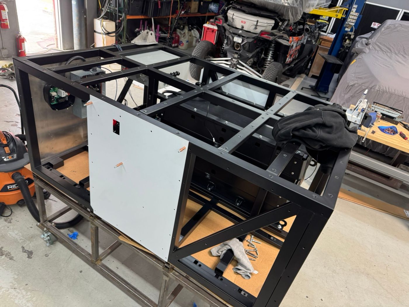 TAP chassis with its first exterior panel installed