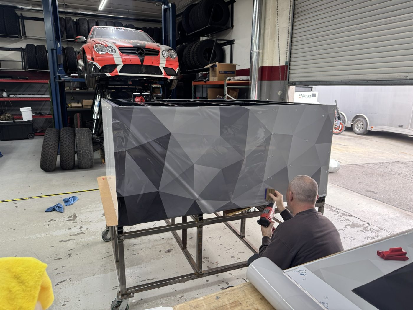 Wrap being applied to the TAP trailer body