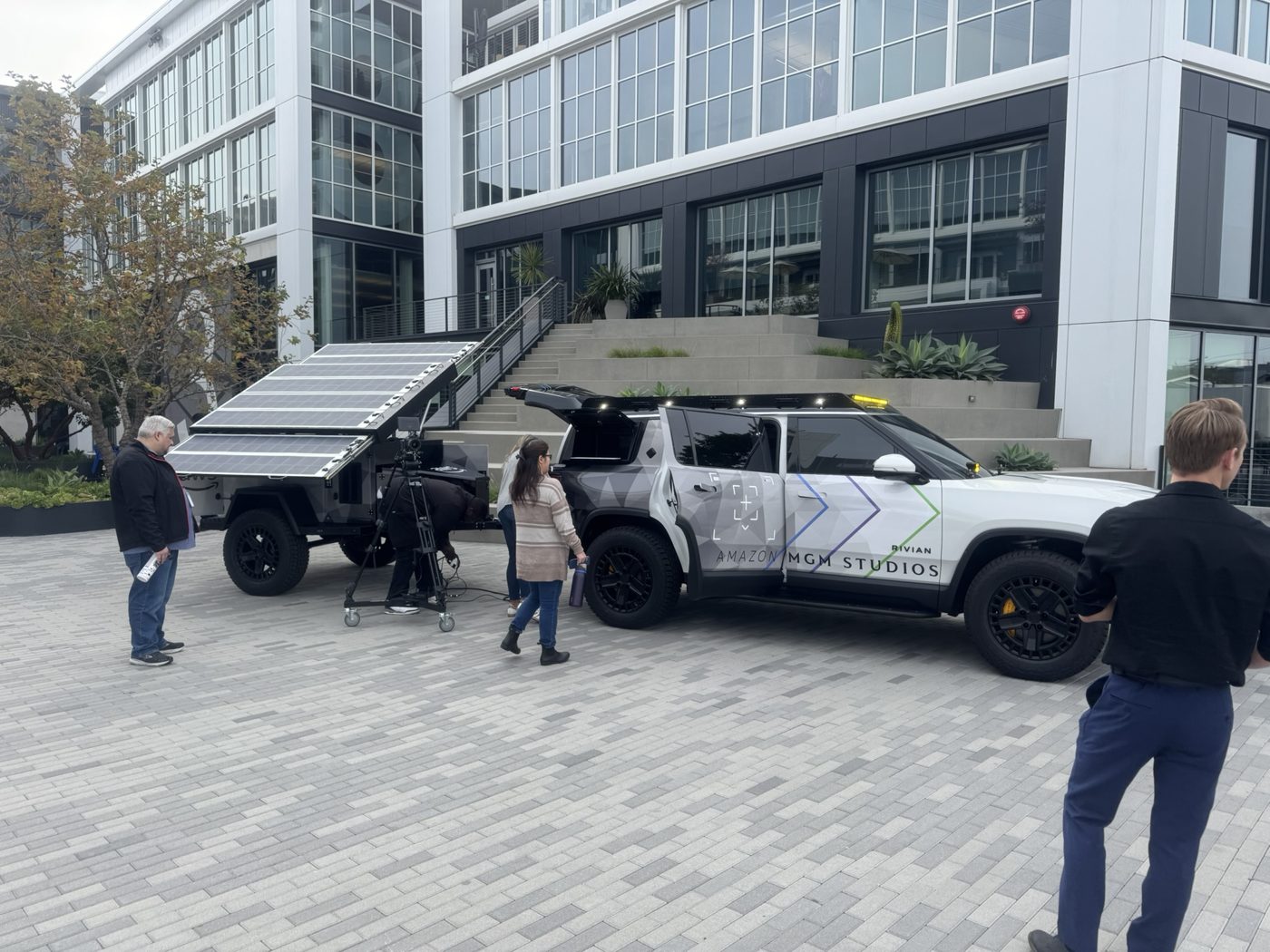 Rivian R1S and TAP trailer with solar deployed at the Amazon MGM Studios campus