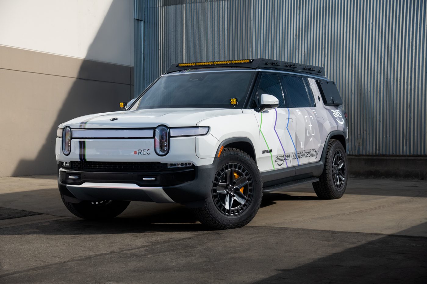 Front view of the Amazon Rivian R1S with DCE roof rack and LED lighting