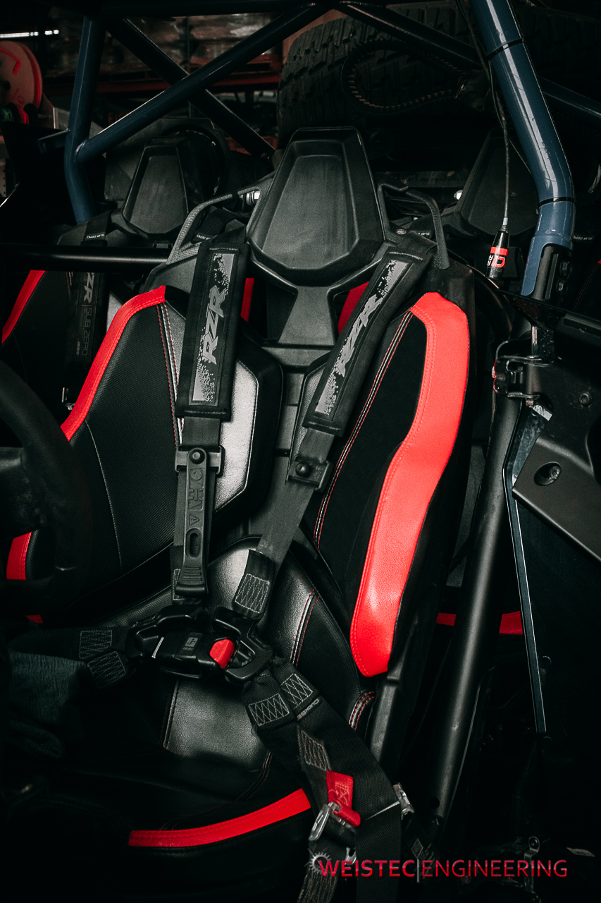 RZR Pro R seat with Weistec Harness Strap Guide installed