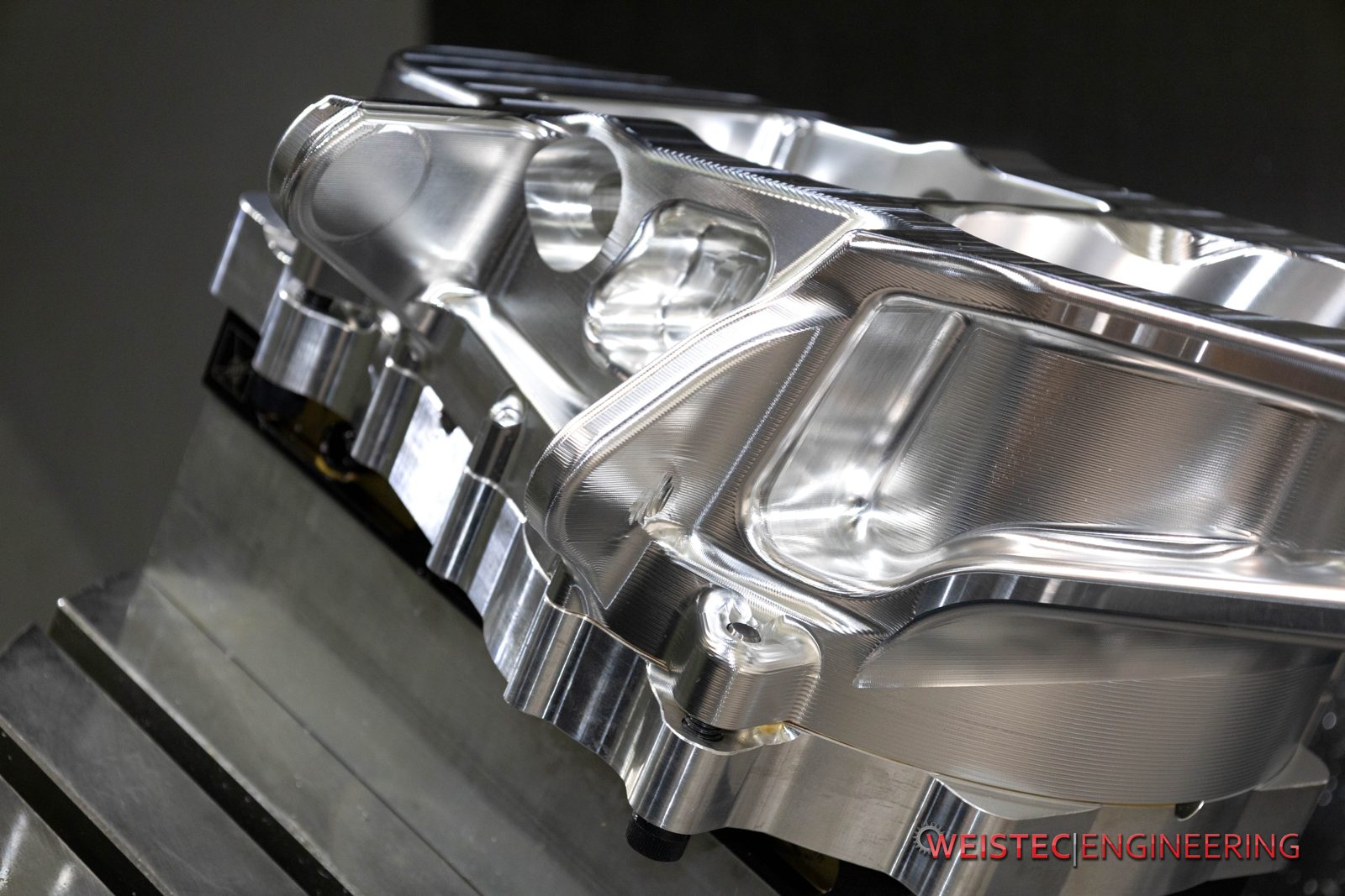 Large 7075 aluminum housing on a 5-axis trunnion after machining