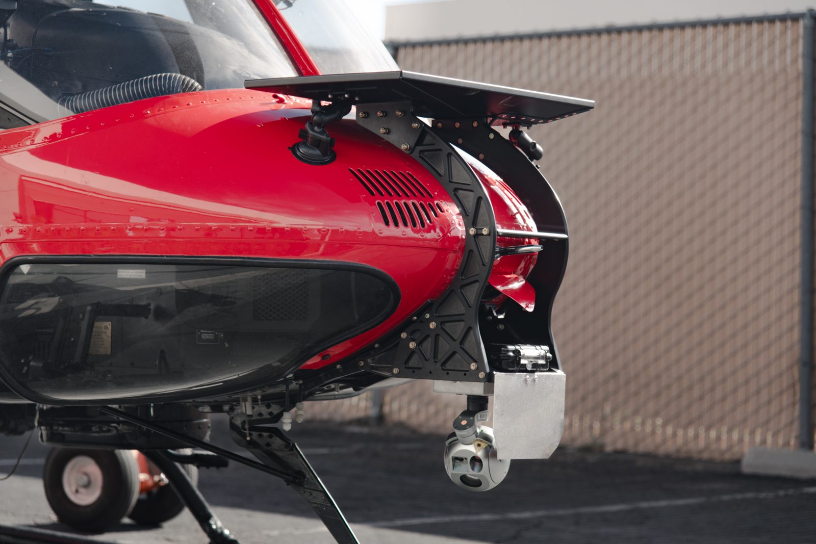 Helicopter nose camera gimbal mount designed and built by Weistec