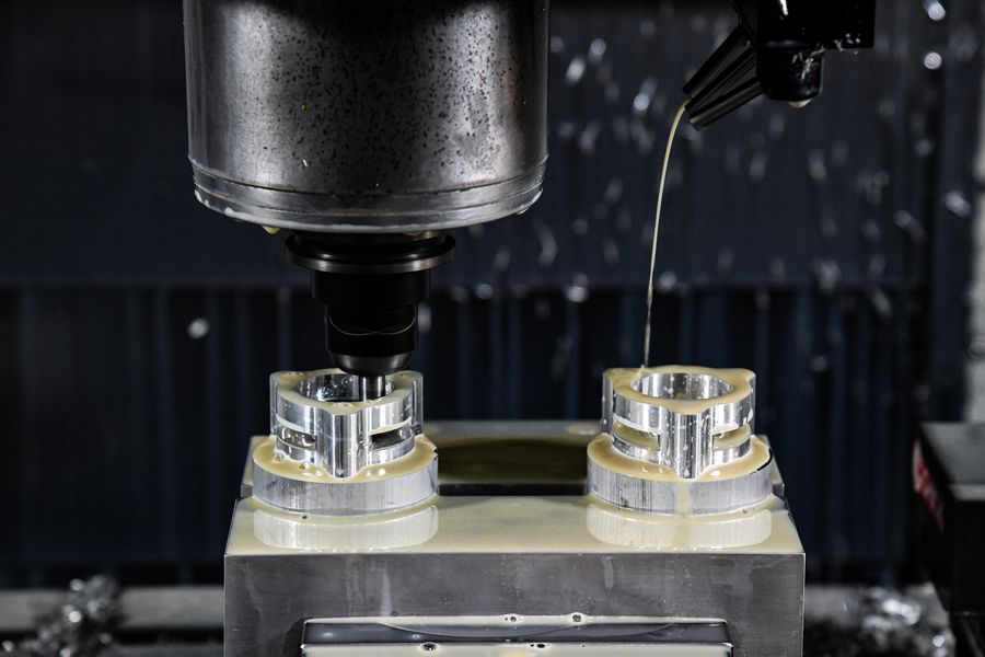 Billet parts being machined on a CNC mill